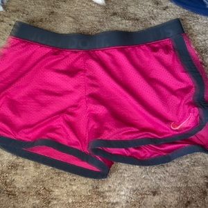 I’m selling these new pink nike shirts.